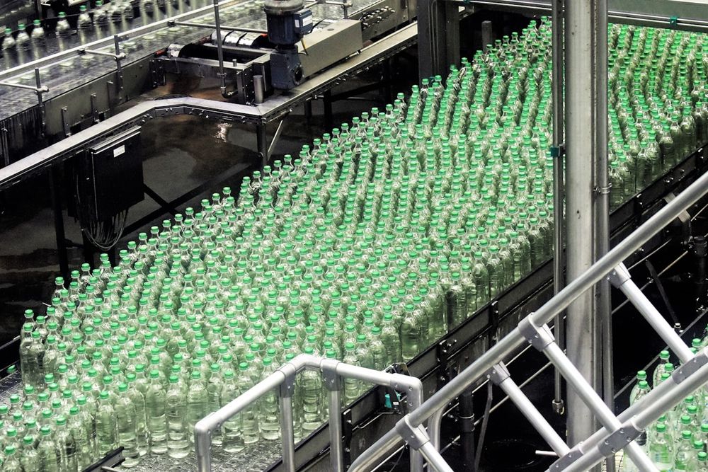 Bottles on a beverage factory conveyor line